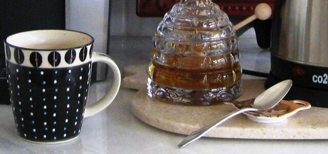 I use my beautiful honey pot, a silver spoon handed down from my mom and a favorite mug at my beverage station.