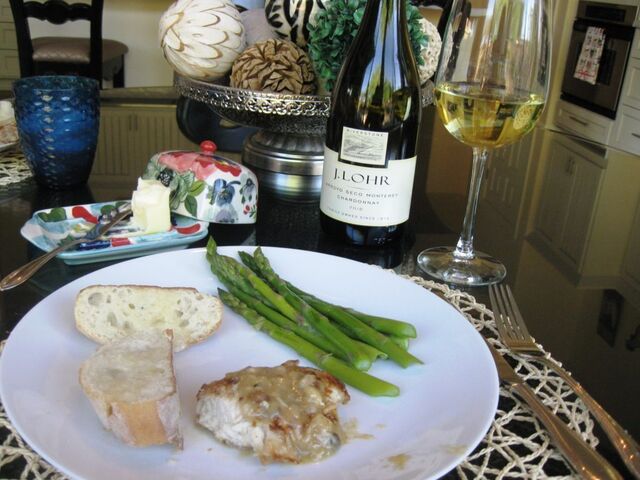 Chicken Francese served with crusty French bread, steamed asparagus spears and my favorite chardonnay