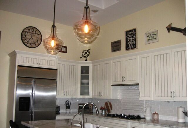 We still love the farmhouse pendants in our kitchen.