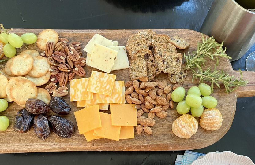 Easy Trader Joe’s charcuterie board with cheese, crackers, fruit, dates and nuts