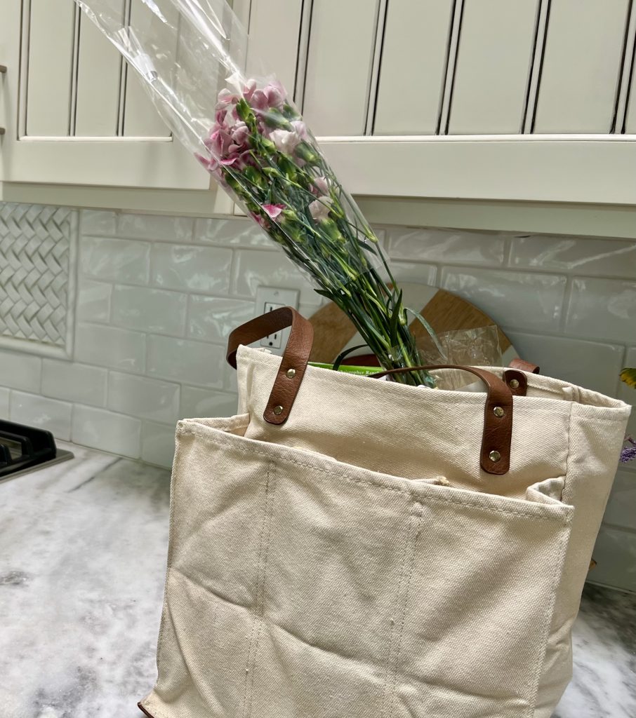 Fresh flowers from Trader Joe's in a kitchen shopping bag