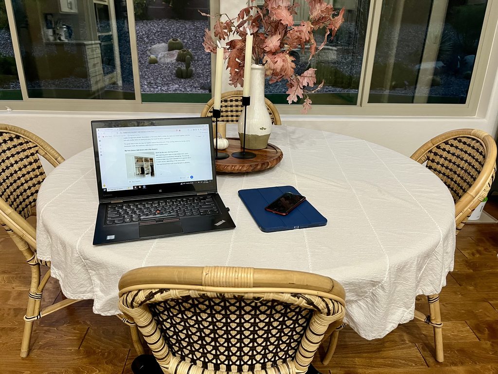Laptop, iPad and phone on table with CatGPT open